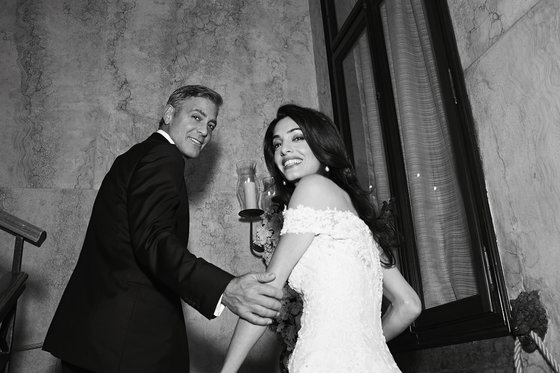 Появились первые снимки со свадьбы Джорджа Клуни и Амаль Аламуддин. Фото