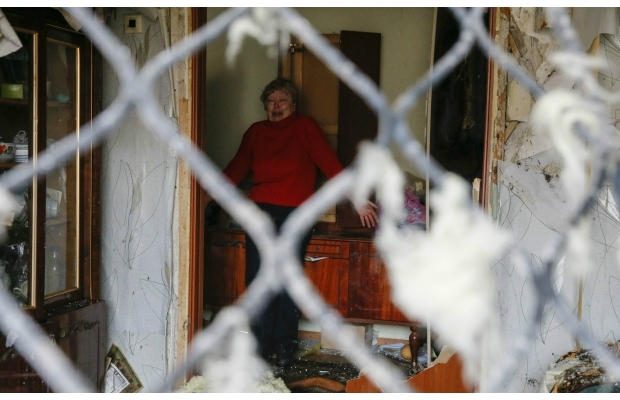 Енакиево после обстрела: испуганные жители и уничтоженные квартиры. Фото