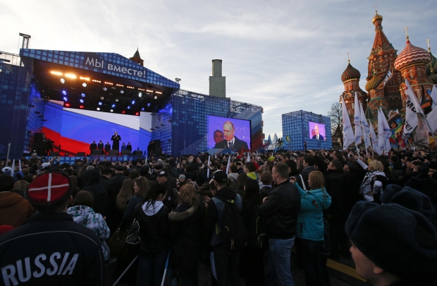 Как Москва отмечает годовщину оккупации Крыма. Фото