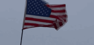 «Азовцы» потроллили Киселева, вывесив флаг США над Широкино. Видео