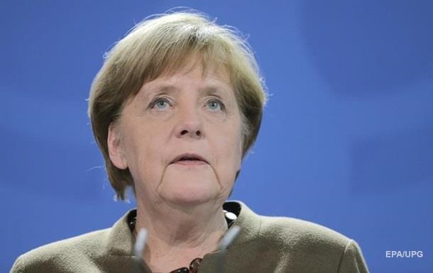 Меркель испугали головой свиньи